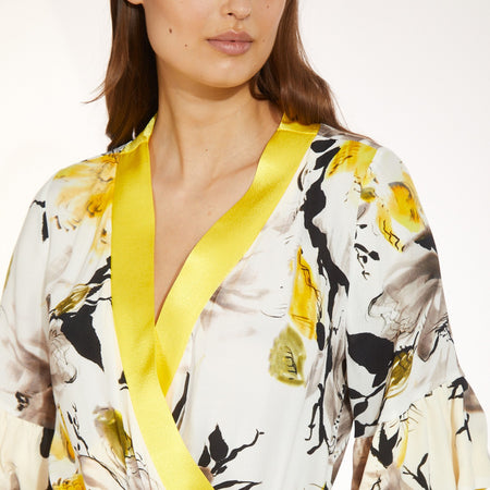 TUTA CON SCOLLO INCROCIATO