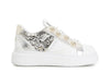 SNEAKERS IN PELLE CON BORCHIE