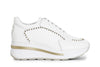 SNEAKERS IN PELLE CON BORCHIE