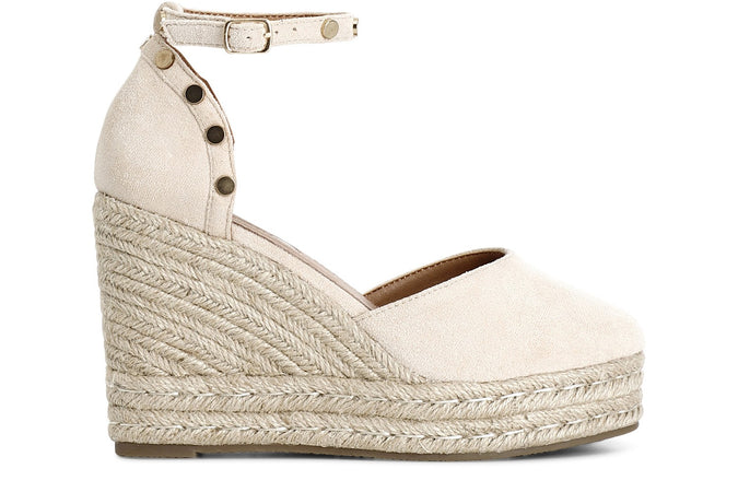 DÉCOLLETÉ IN TESSUTO CON BORCHIE SU ZEPPA CORDA