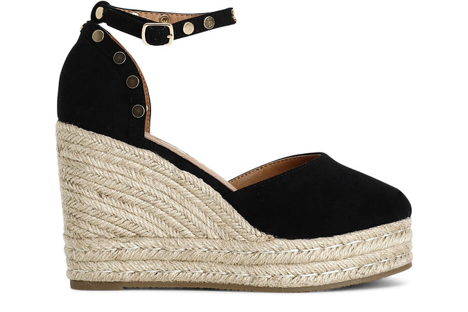 DÉCOLLETÉ IN TESSUTO CON BORCHIE SU ZEPPA CORDA