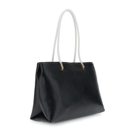 shopping con manici tubolari e applicazione di catene in metallo con infilatura