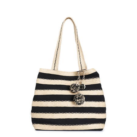 SHOPPING IN RAFFIA E CANVAS, CON CHARM CON POMPON E PIASTRINA LOGO IN METALLO