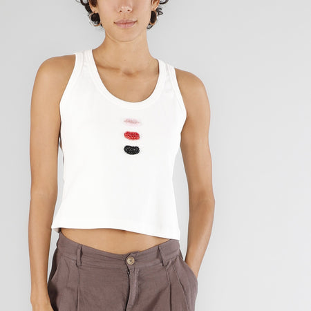 CANOTTA SCOLLATA CON PATCH