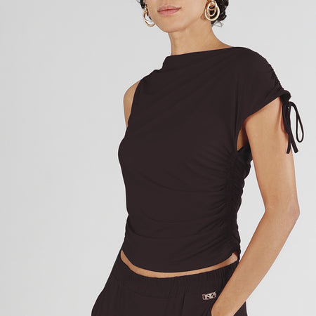 TOP ASIMMETRICO CON DRAPPEGGIO LATERALE