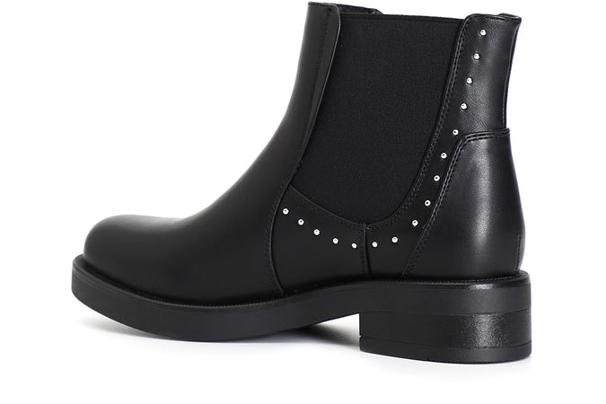 TRONCHETTO CON ELASTICO IN SIMILPELLE SPAZZOLATA E BORCHIE