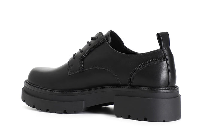 DERBY IN SIMILPELLE CON PROFILI IN STRASS