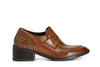 MOCASSINO IN PELLE CON BORCHIE