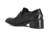 MOCASSINO IN PELLE CON BORCHIE