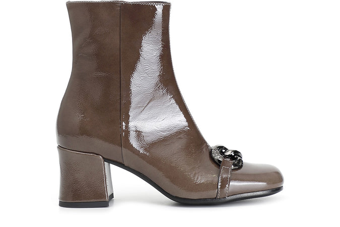 TRONCHETTO IN VERNICE CON MORSETTO