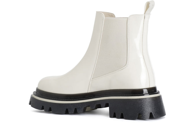 TRONCHETTO IN VERNICE SINTETICA CON ELASTICO