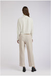 MAGLIA COLLO ALTO SPALLE INCRESPATE