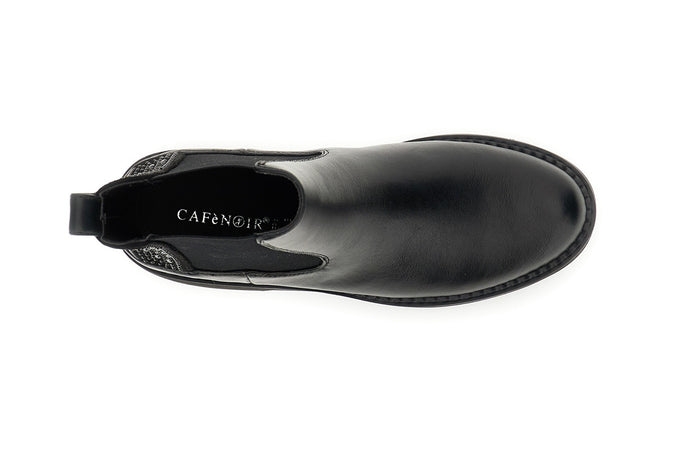 TRONCHETTO IN SINTETICO EFFETTO PELLE CON ELASTICO E INSERTI DI STRASS E BORCHIE