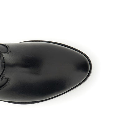 TRONCHETTO IN PELLE CON DISEGNO ALTORILIEVO