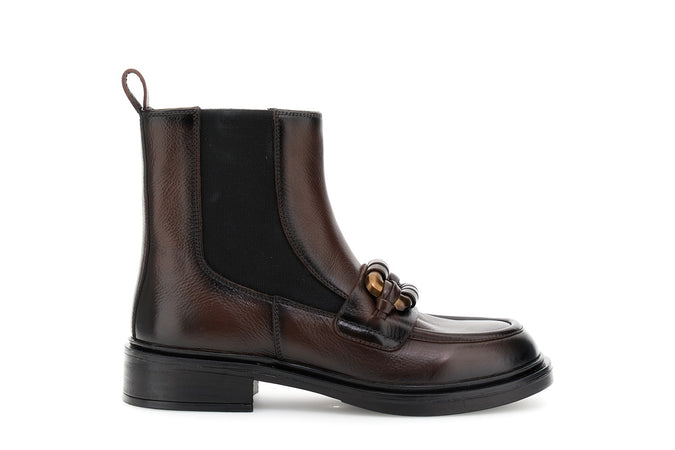 TRONCHETTO IN PELLE CON ELASTICO E ACCESSORIO FASCIATO