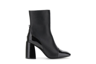 TRONCHETTO IN PELLE CON RIPORTI EFFETTOVERNICE