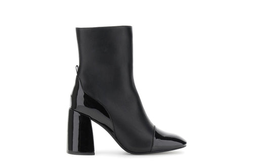 TRONCHETTO IN PELLE CON RIPORTI EFFETTOVERNICE