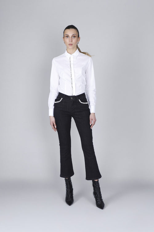 DENIM CROPPED FLARE CON STRAS ALLE TASCHE