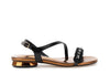 SANDALO ASIMMETRICO IN SINTETICOEFFETTOPELLE LAMINATA CON ACC. STRASS