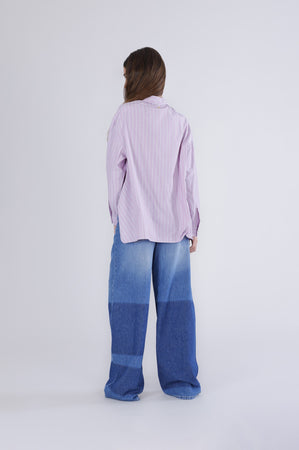 CAMICIA RIGATA ASIMMETRICA CON CULISSEAL FONDO