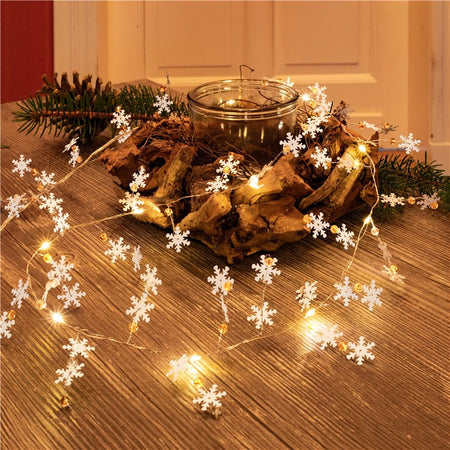 Stringa 10 LED Fiocchi di Neve IP20 Bianco Caldo a Batteria con Timer