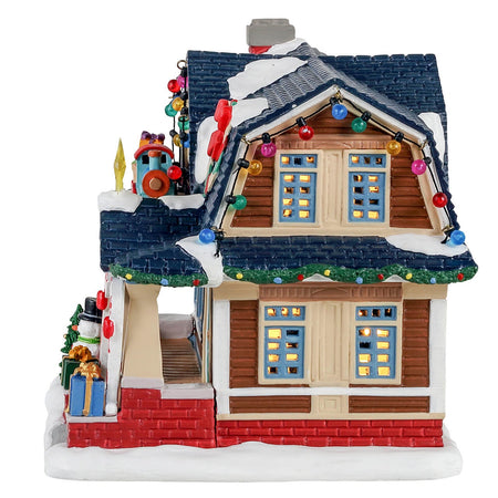 Casa natalzia "Cooper's Cottage" in porcellana con luci ed animazioni per villaggio di Natale