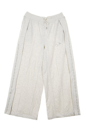 Nike Pantalone Tuta Leggero Donna W Sportswear Pant Earth Day French Terry Mr Oatmeal Heather/light Bone/white da donna