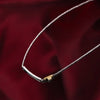 Collana TRUSSARDI donna T-Logo acciaio / oro / cristalli bianchi