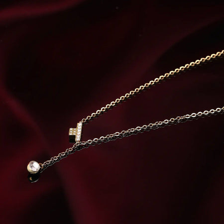 Collana TRUSSARDI donna T-Logo dorata / punto luce
