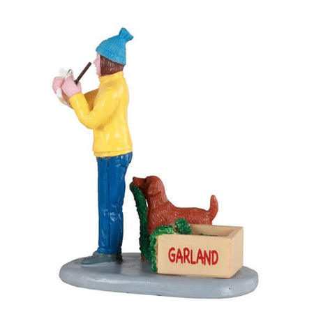 Statuette decorative in poliresina "Prepararsi al Natale in famiglia" per villaggio di Natale