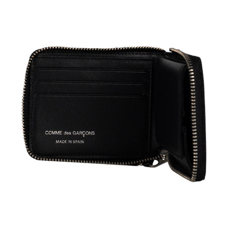 COMME DES GARCONS WALLET Silver Eyelet portafoglio in pelle in nero da donna