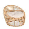 Poltrona Camaleonte con struttura in rattan e cuscino