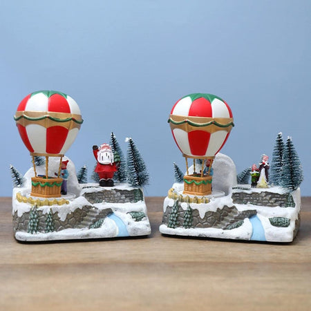 Decorazione Mongolfiera Natalizia Neve Luci Musica Con Movimento 18x13x19.5cm 2 Modelli