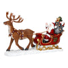 Statuetta Babbo Natale su slitta con alce in poliresina per decorazioni natalizie