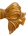 Biscottini Decoro a forma di fiocco in legno finitura foglia oro anticato L67xPR7xH38 cm Made in Italy
