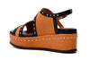 SANDALO ZEPPA ASIMMETRICO IN PELLE CON BORCHIE