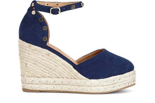 SANDALI IN TESSUTO CON BORCHIE SU ZEPPACORDA