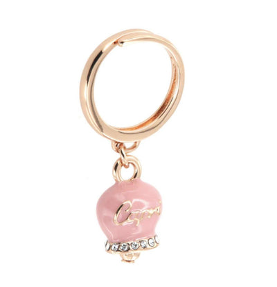 BYSIMON - Anello con campanella portafortuna pendente smalto rosa e cristalli