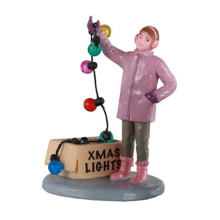 Statuette decorative in poliresina "Prepararsi al Natale in famiglia" per villaggio di Natale