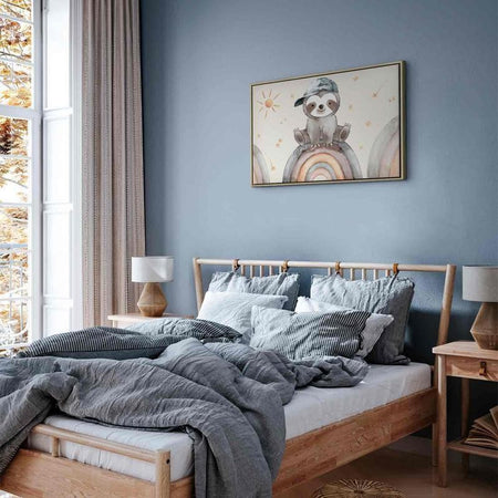 Quadro - Happy Sloth - Sloth in Subdued Colors Wearing a Cap Sitting on a Rainbow Among Little Stars