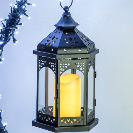 Lanterna in vetro e metallo esagonale con candela avorio effetto fiamma regolabile con telecomando incluso.