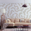 Carta da parati - Abstract composition - beige patterns in shapes on a white background