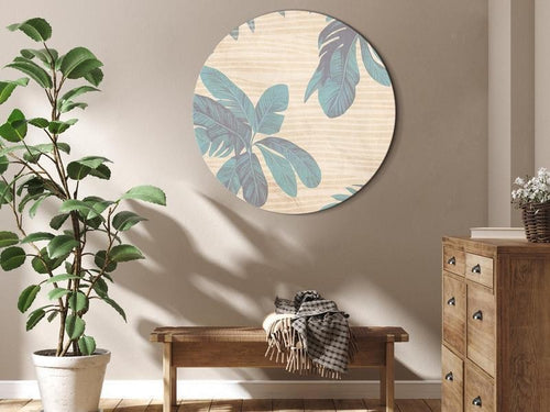 Quadro rotondo - Palm trees behind the mist - Showy palm leaves in a soft shade of green on a slightly wavy sand backgro