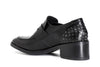 MOCASSINO IN PELLE CON BORCHIE