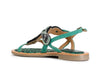 SANDALO INFRADITO IN CAMOSCIO E STAMPA MACULATA CON ACCESSORIO STRASS