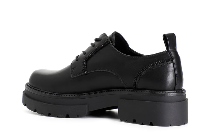 DERBY IN SIMILPELLE CON PROFILI IN STRASS