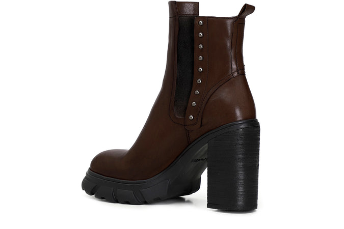 TRONCHETTO IN PELLE CON ELASTICO E BORCHIE