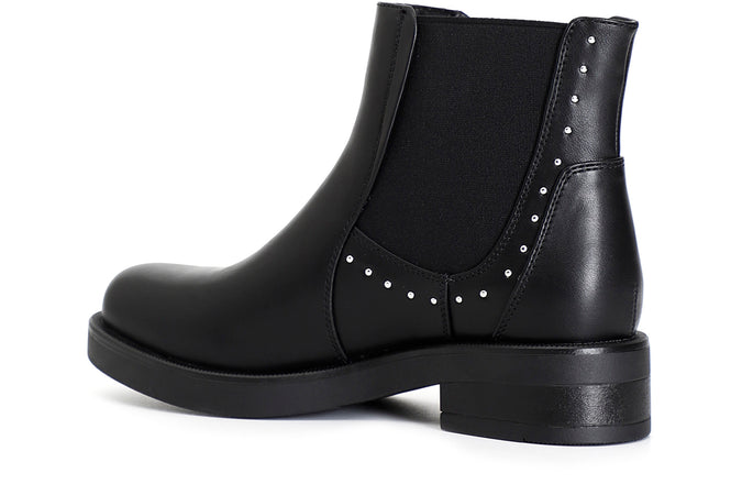 TRONCHETTO CON ELASTICO IN SIMILPELLE SPAZZOLATA E BORCHIE