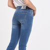 PANTALONE SLIM CON ROTTURE