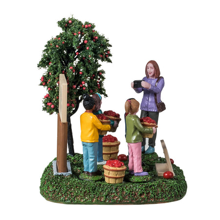 Personaggi per villaggio di Natale "Gita scolastica autunnale" in resina